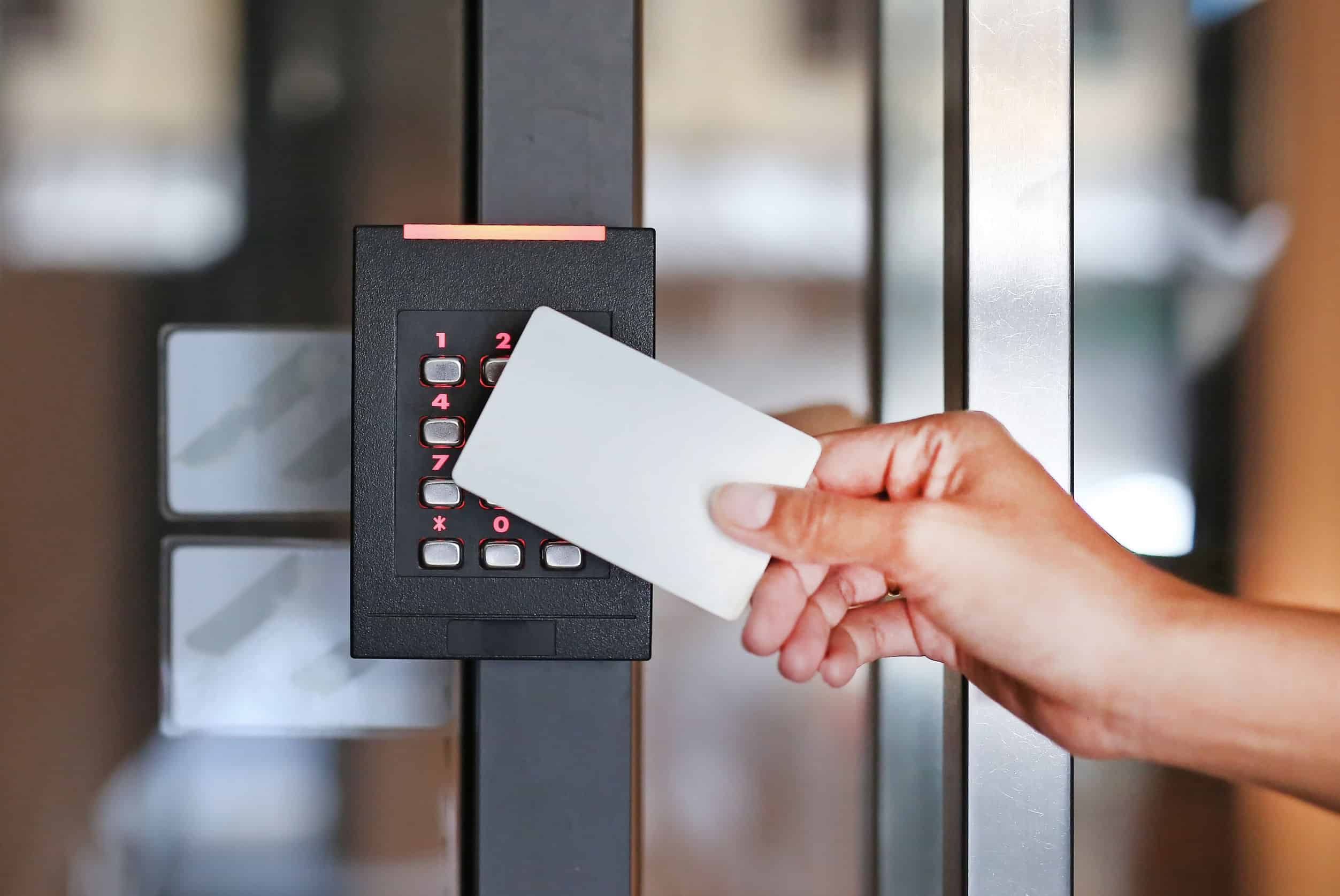 Key card being held up to security card reader